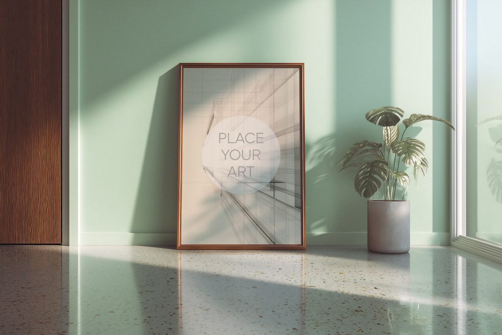 wall-art-frame-mockup-atomic-era-retro-mint-wall-plant-terrazzo.jpg Vertical wooden wall art frame mockup leaning on a polished terrazzo floor against a sage mint green wall with a potted monstera plant and natural sunlight shadows.