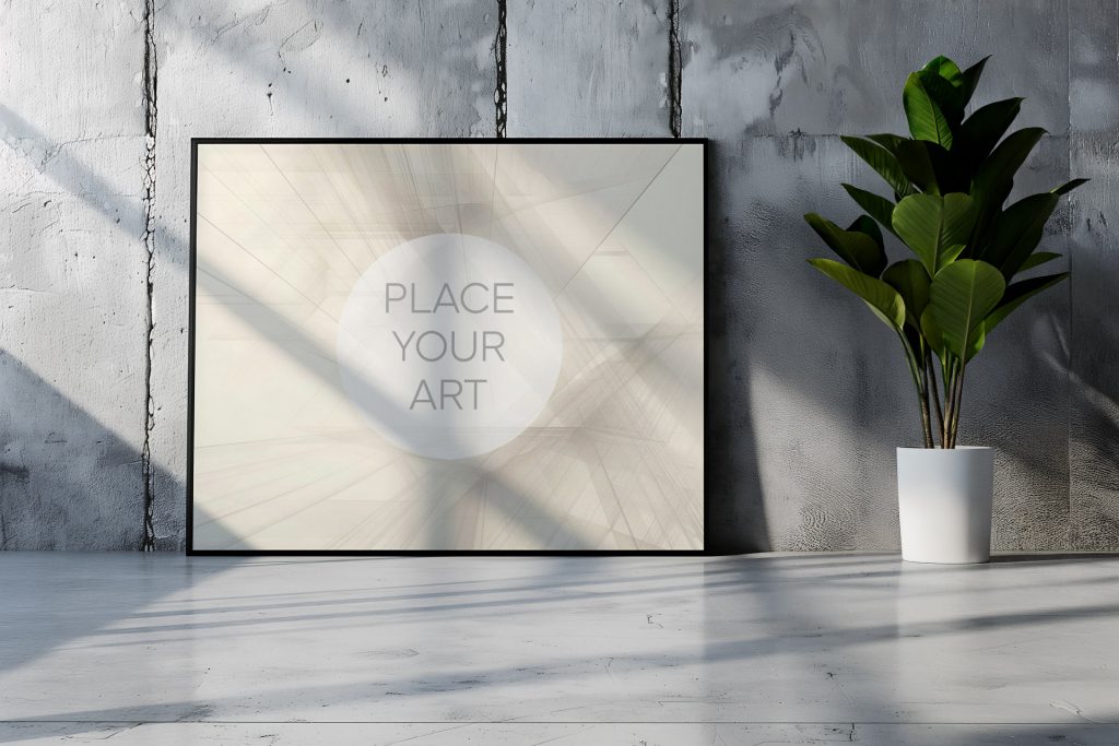 Large landscape wall art mockup leaning on a concrete studio floor next to a white potted plant against a raw industrial concrete wall with vertical cracks and shadows.