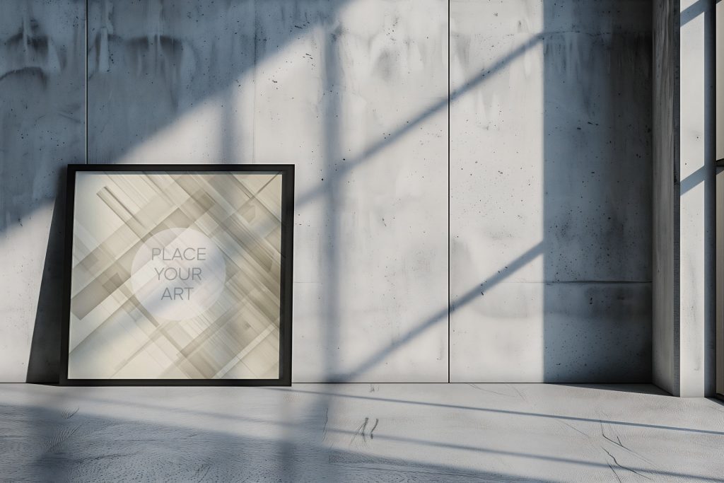 Large square wall art mockup leaning on a polished cement floor against a minimal brutalist concrete wall with geometric industrial window shadows.