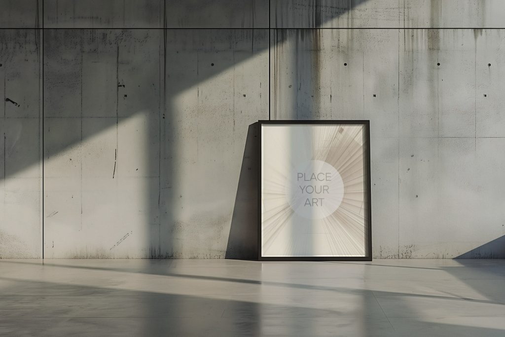 Large vertical wall art mockup leaning on a polished cement floor in an expansive brutalist space with dramatic geometric sunlight shadows crossing a high concrete wall.