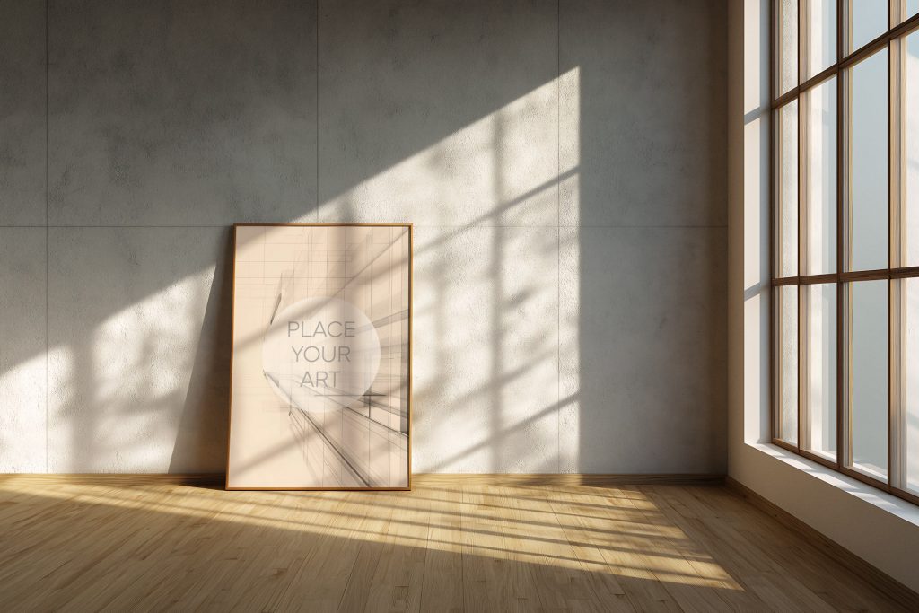 japandi-vertical-frame-mockup-large-window-sunlight-shadows.jpg Vertical wooden frame mockup leaning on a concrete-textured wall in an empty room with a large window and strong sunlight shadows.