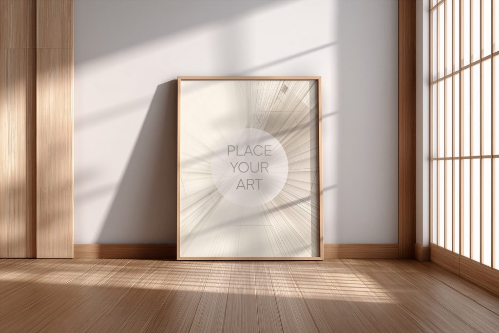 Vertical wooden frame mockup leaning on a white wall in a Japandi room with traditional shoji screens and linear sunlight shadows on a wooden floor.