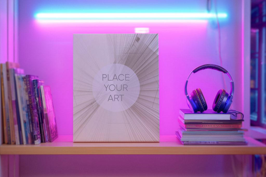Lo-Fi shelf mockup with a vertical canvas frame, cyan and magenta neon tube light, headphones, and book stacks.