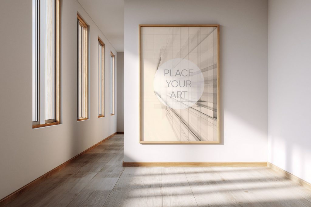 minimalist-hallway-gallery-mockup-vertical-oak-frame.jpg Large vertical wooden frame mockup on a white wall in a bright minimalist hallway with rhythmic window light patterns on the wooden floor.