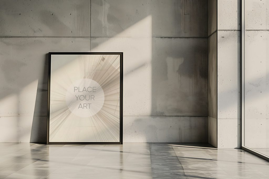 Vertical frame mockup leaning on a reflective polished cement floor against a raw brutalist concrete wall split by a dramatic diagonal sunlight shadow.